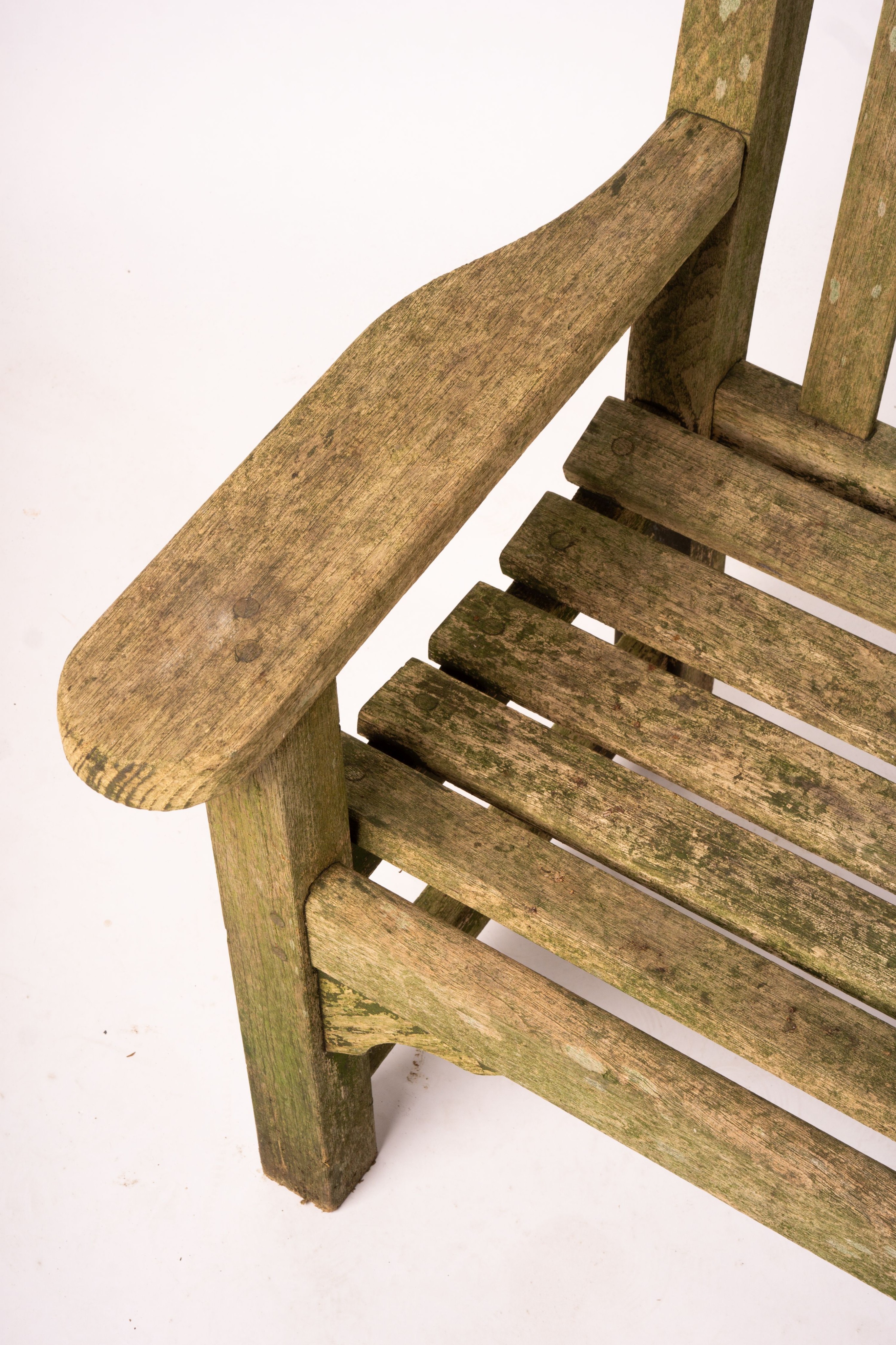 A weathered teak garden bench, length 192cm, width 60cm, height 85cm